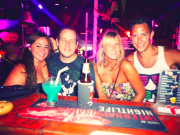 Making the most of the lively nightlife. And looking very tanned I might add!