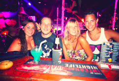 Making the most of the lively nightlife. And looking very tanned I might add!