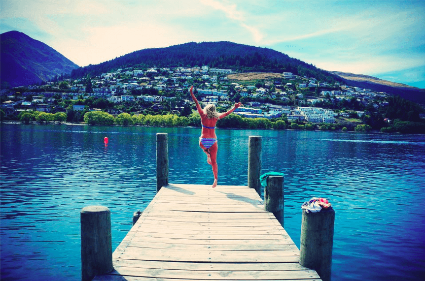 jumping into a lake new zealand queenstown