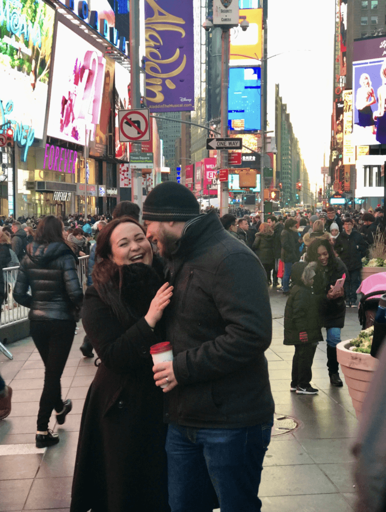 Elle and husband in Times Square NYC