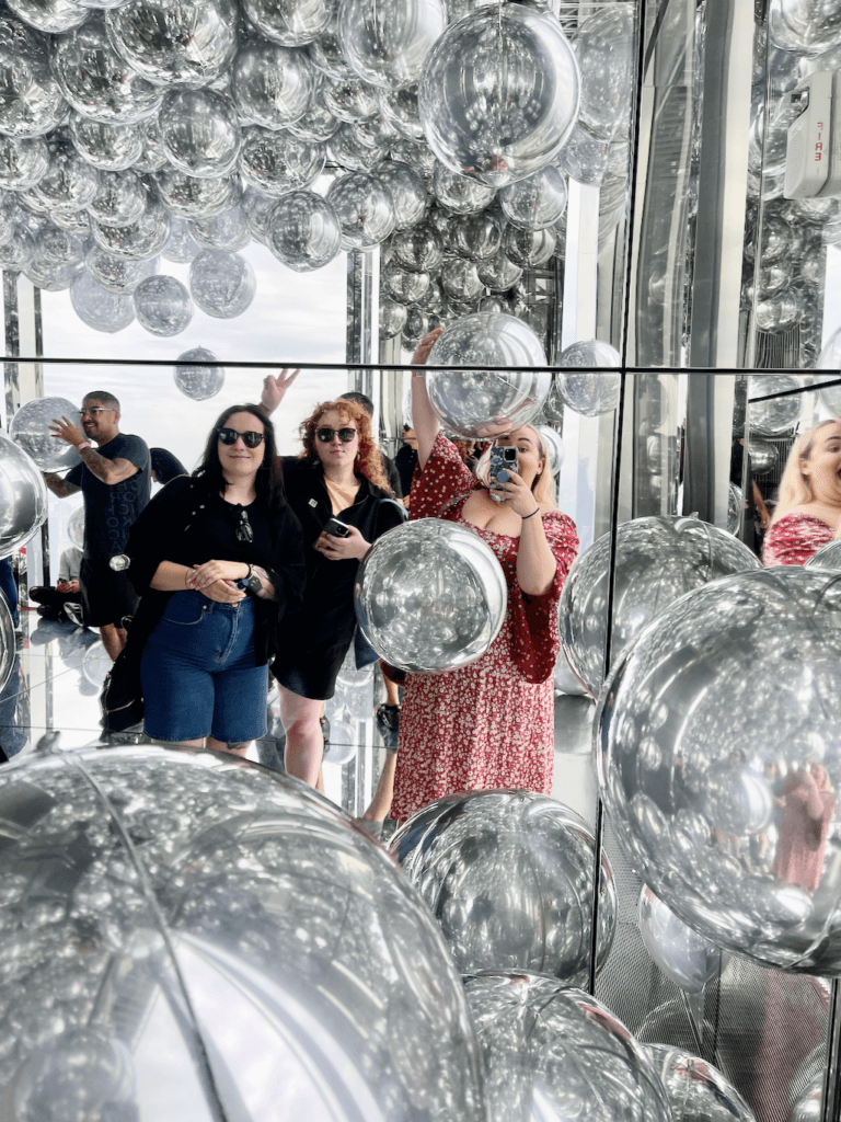 My friends and I in the balloon room at Summit One Vanderbilt