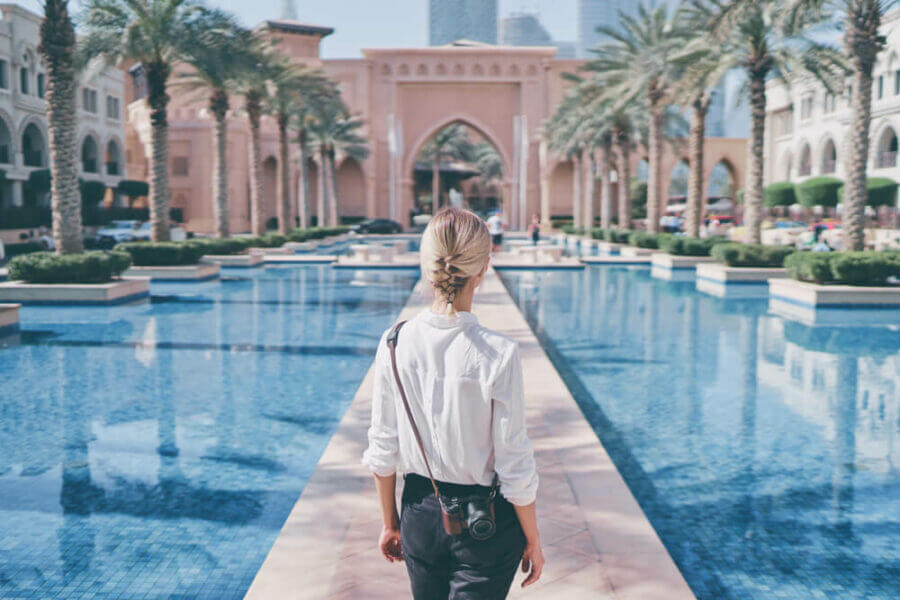 woman walking alone in luxury hotel