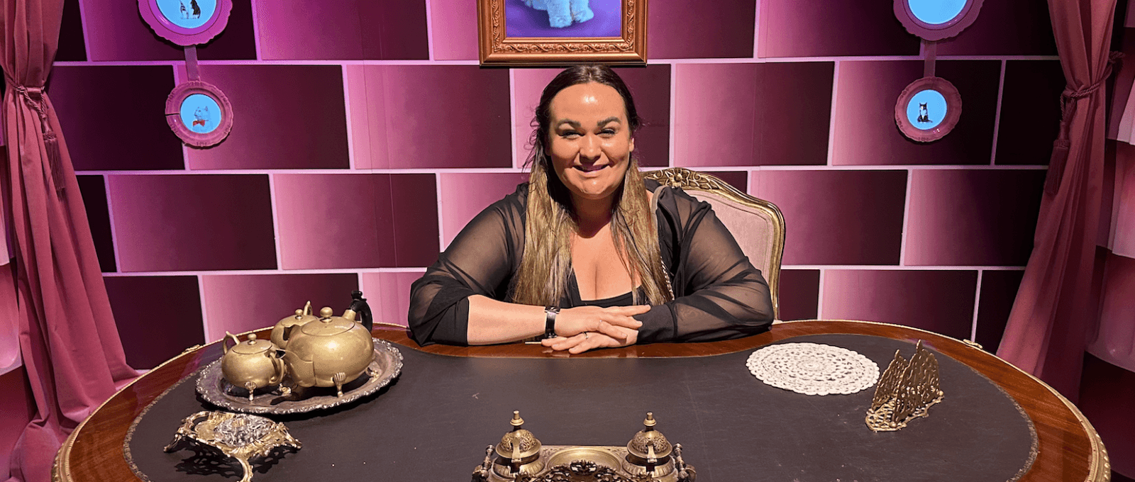 Ellie sat in Umbridge's office at the Harry Potter exhibition