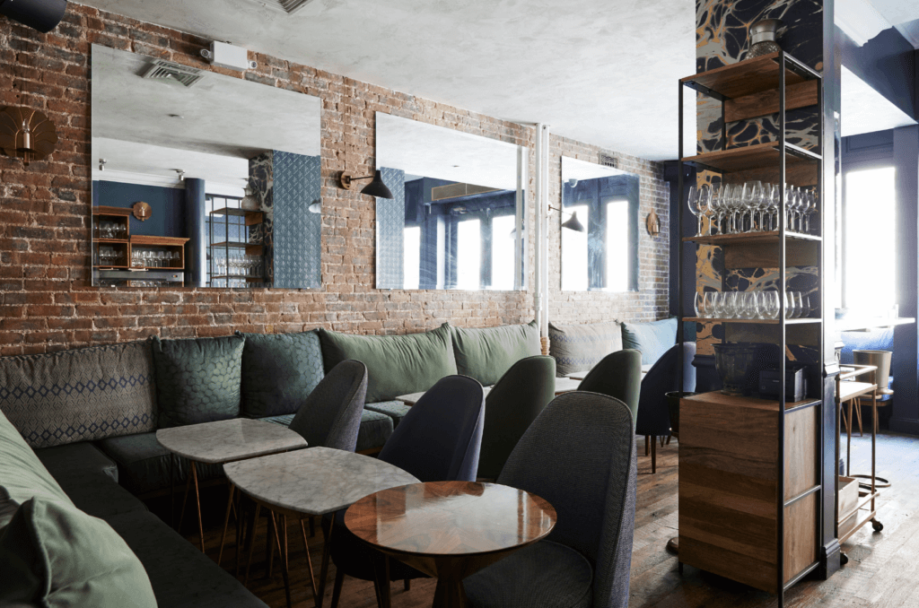 The cozy interiors at Compagnie des Vins Surnaturels in Little Paris. 