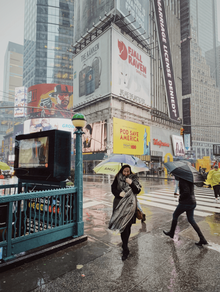 Ellie looking windswept in a NYC storm