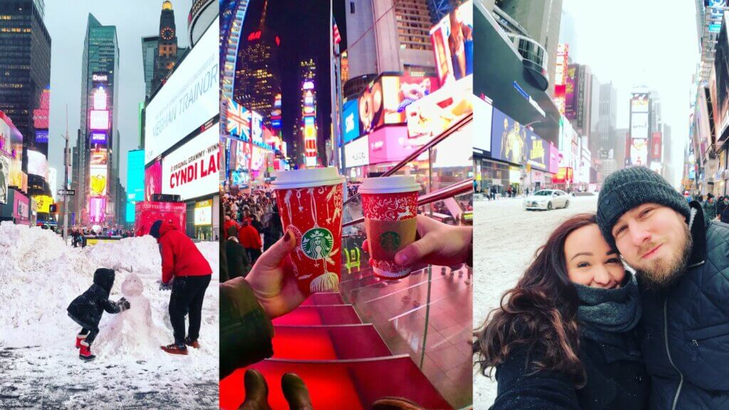 Elle and her husband in Times Square in the snow at Christmas in NYC