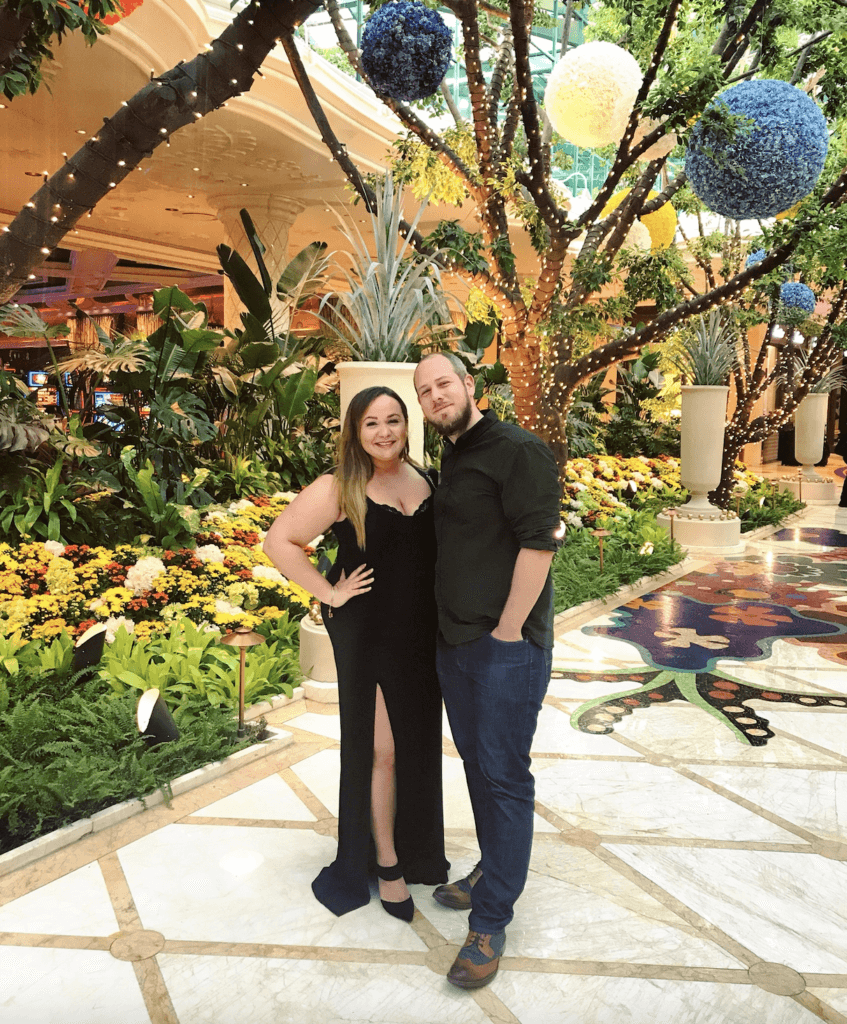 Elle and husband dressed up in the Wynn Lobby in Las Vegas