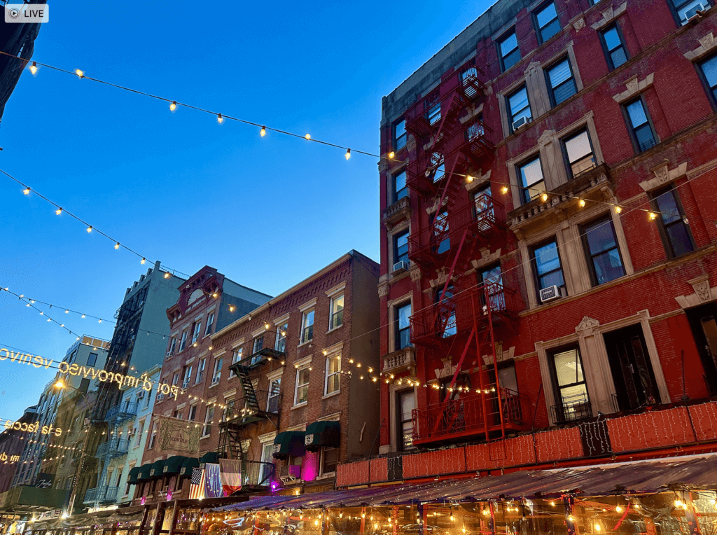 Little Italy in NYC lit up in the evening. 