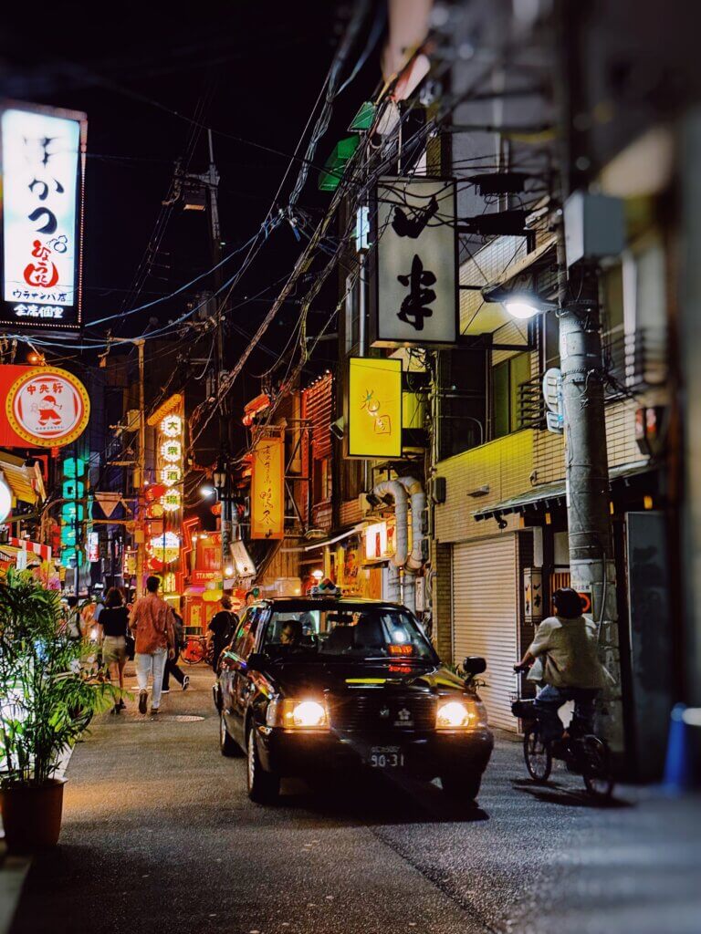 A lonesome taxi on an Osaka street.
