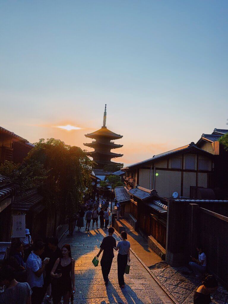 Just two people, looking over a famous temple in Kyoto.